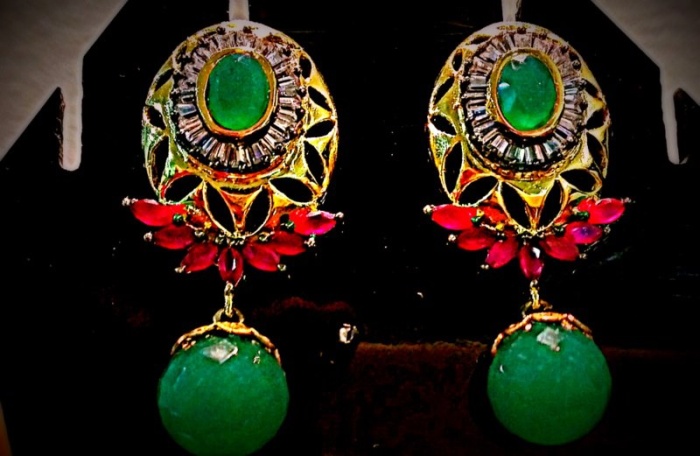 emerald-ruby and zircons gold plated inr 3500