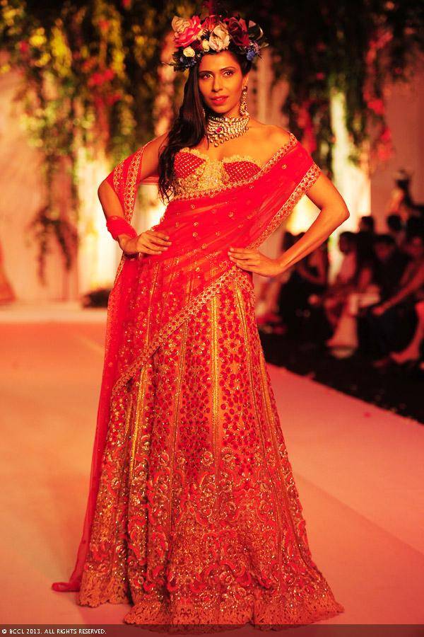 Candice-Pinto-displays-a-creation-by-designers-Falguni-and-Shane-Peacock-on-Day-3-of-India-Bridal-Fashion-Week-in-New-Delhi-on-July-25-2013
