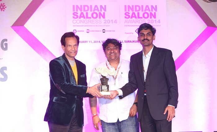 L to R - Jahir Habib and Murali Sundar, Country Manager, Schwarzkopf Professional presenting award to Rahul Bhalchandra, CEO and Director, YLG Salon