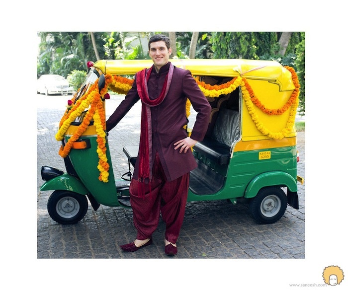 Groom arrives in an autorikshaw for his Baraat