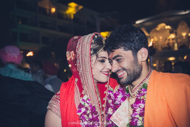 Bollywood themed destination Goa wedding- red Lehenga orange sherwani