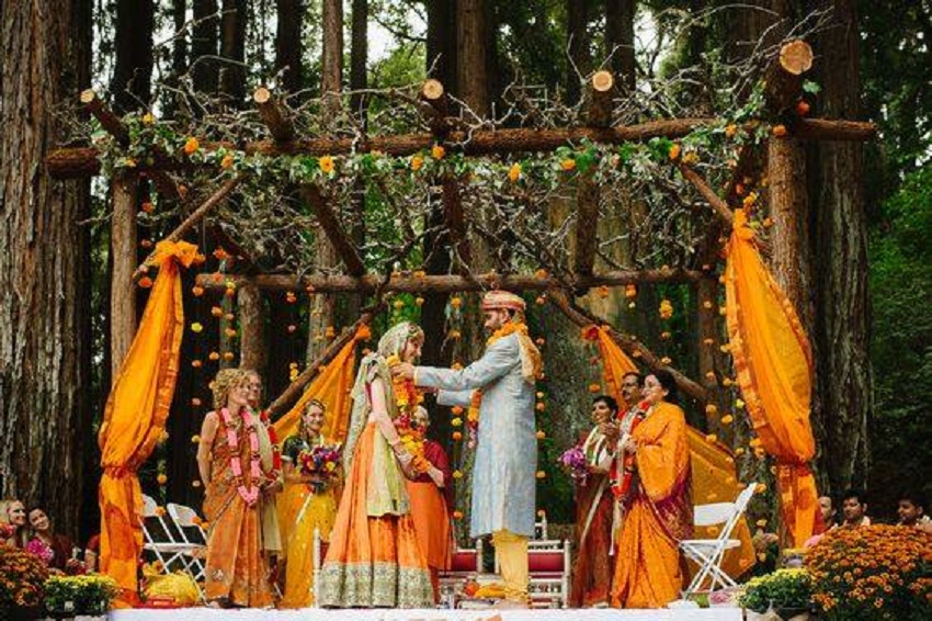 beautiful orange gold themed wedding by Xenia Hospitality LLP