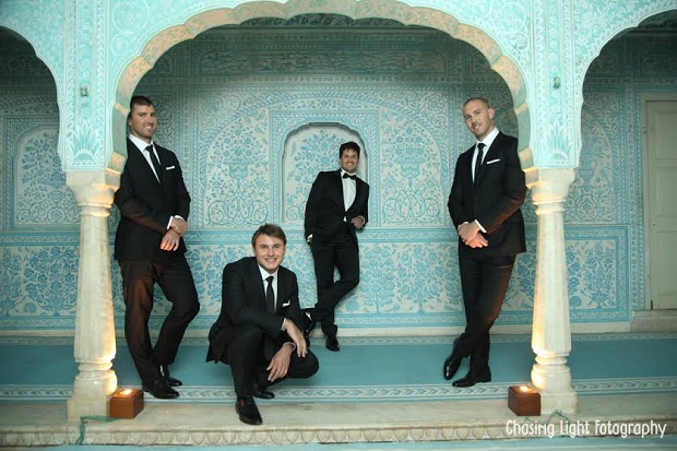 groomsmen standing before the Samode Palace Jaipur durbar Hall wedding ceremony