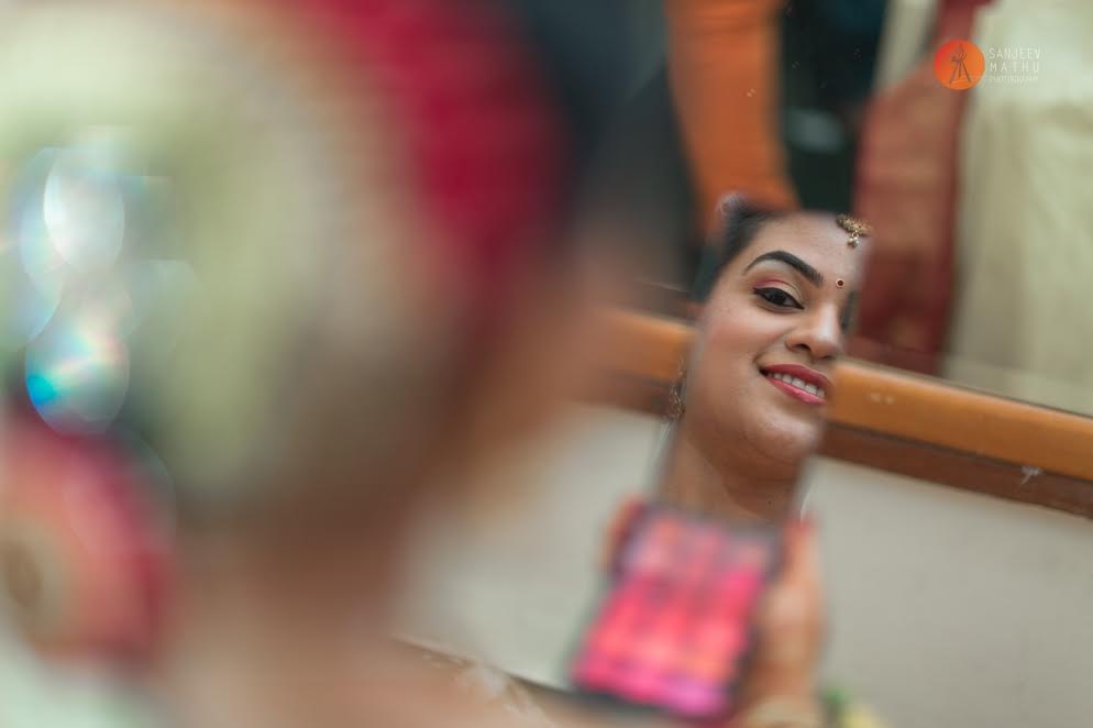 bride getting ready-bride and groom real wedding by Sanjeev Mathu photography