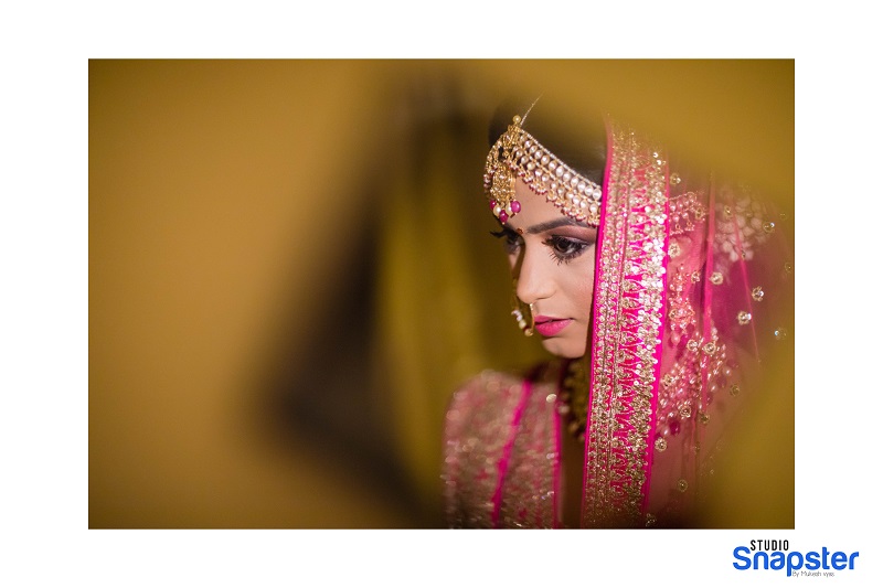 pink lehenga real wedding beautiful bridal hairstyle Indian real wedding by Studio Snapster Raipur
