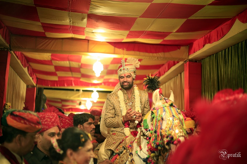 groom arrives on his horse Pratik Photoworks real wedding in Jaisalmer