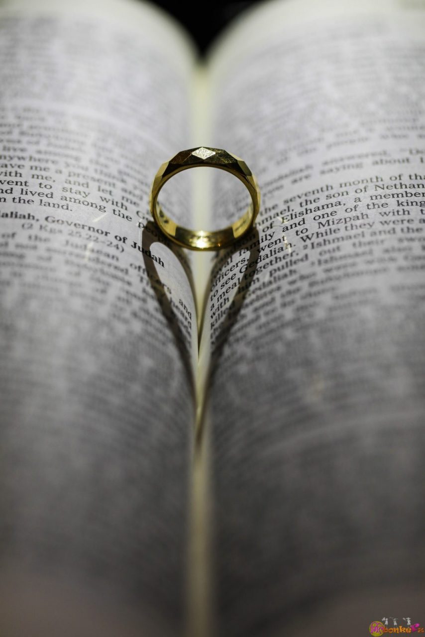 wedding ring in a book theme