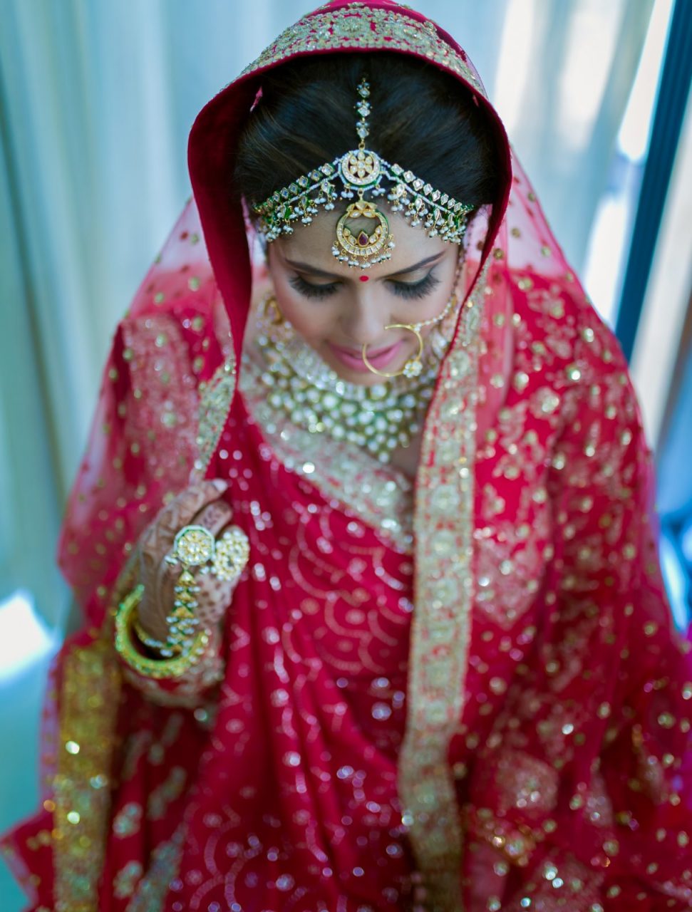 beautiful real wedding of twin sisters pink lehengas matching jewelry
